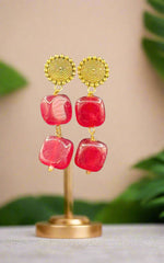 Mona lisa stones with golden studs earrings.