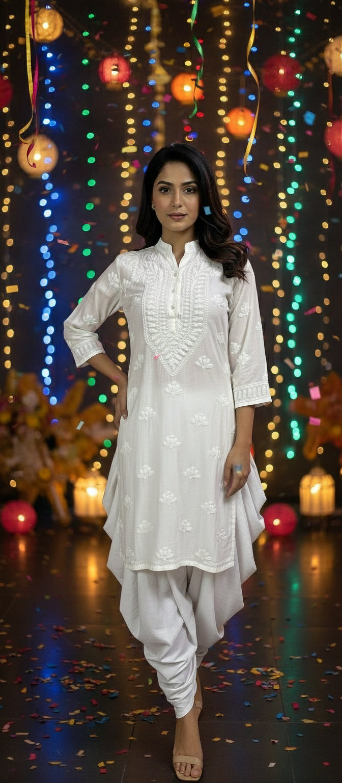 Muslin fabric white Chikankari short length kurti with collar and buttons, featuring intricate hand embroidery with floral motifs by famaza couture
