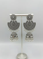 Ornate silver earrings with a small jhumka by famaza couture