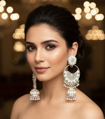 Ornate silver earrings with pearls and gemstones by famaza couture