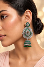 oxidised tone tear drop earrings with bottle green nano stones and hanging are wornby mode