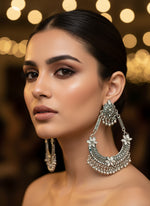 Decorative silver earring by famaza couture