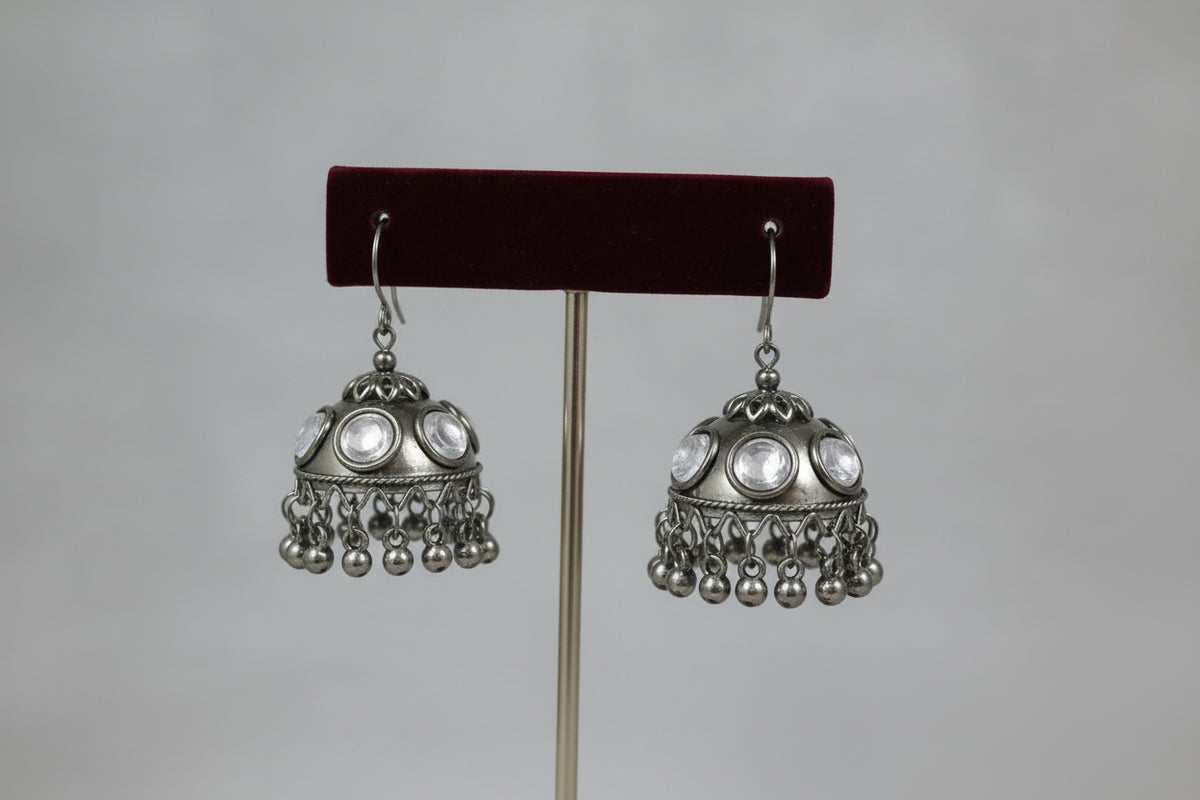 Oxidised jhumka statement earrings in antique silver finish – front view