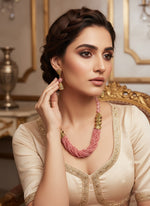 Pink braided mala with gold accents and matching earrings by famaza couture