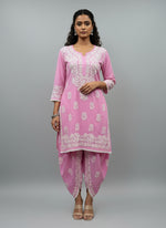 Pink colour cotton fabric kurti and dhoti trousers back side design is showing in this image.