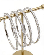 Stackable 4-piece American diamond bangle set in silver – slim eternity row design on female wrist – daily wear jewellery