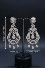 Premium American Diamond statement earrings displayed on a stand with measurements.