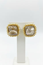 Premium iridescent mother of pearl earring studs.