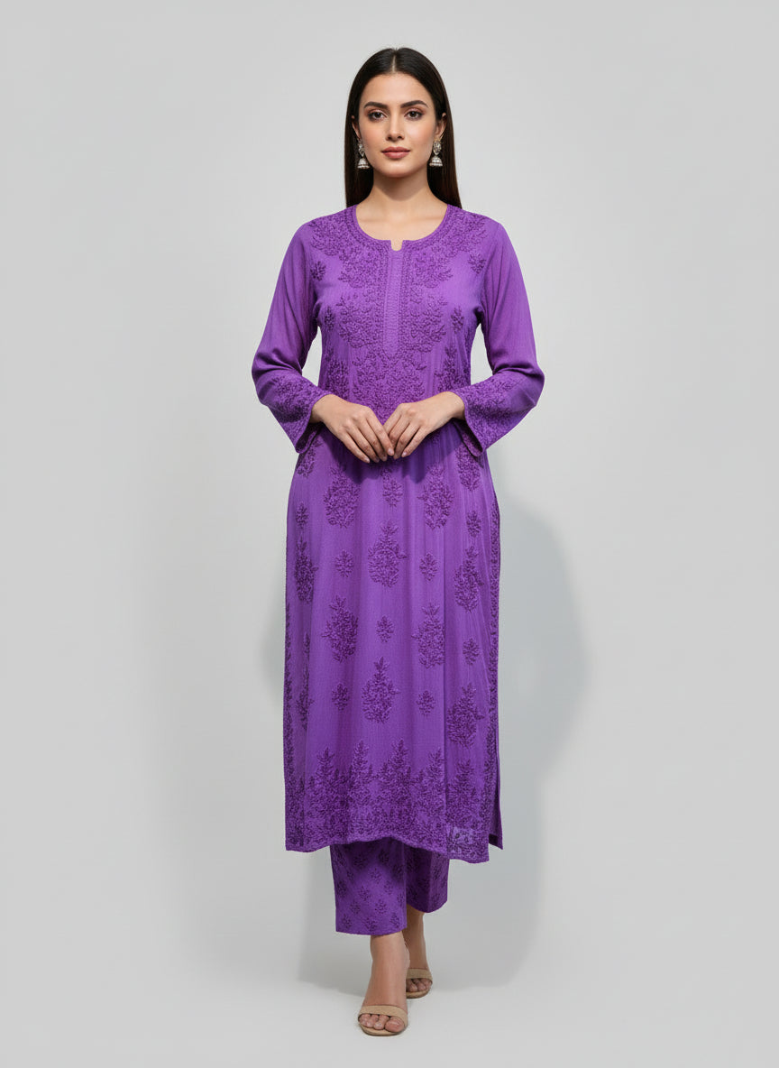 Purple colour modal fabric tone to tone hand embroidered kurti and trousers. Kurti is 46 inches long