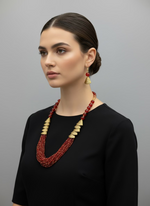 Red beaded mala necklace with gold accents and matching earrings by famaza couture