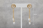 Rose Gold dangling earrings.