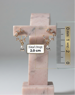 Rose Gold studs earrings displayed with drop length.