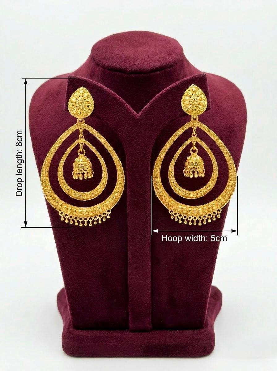 Royal Heritage gold plated double layer chandbali jhumka earrings with 5cm hoop width and 8cm drop length on a luxury maroon velvet stand.