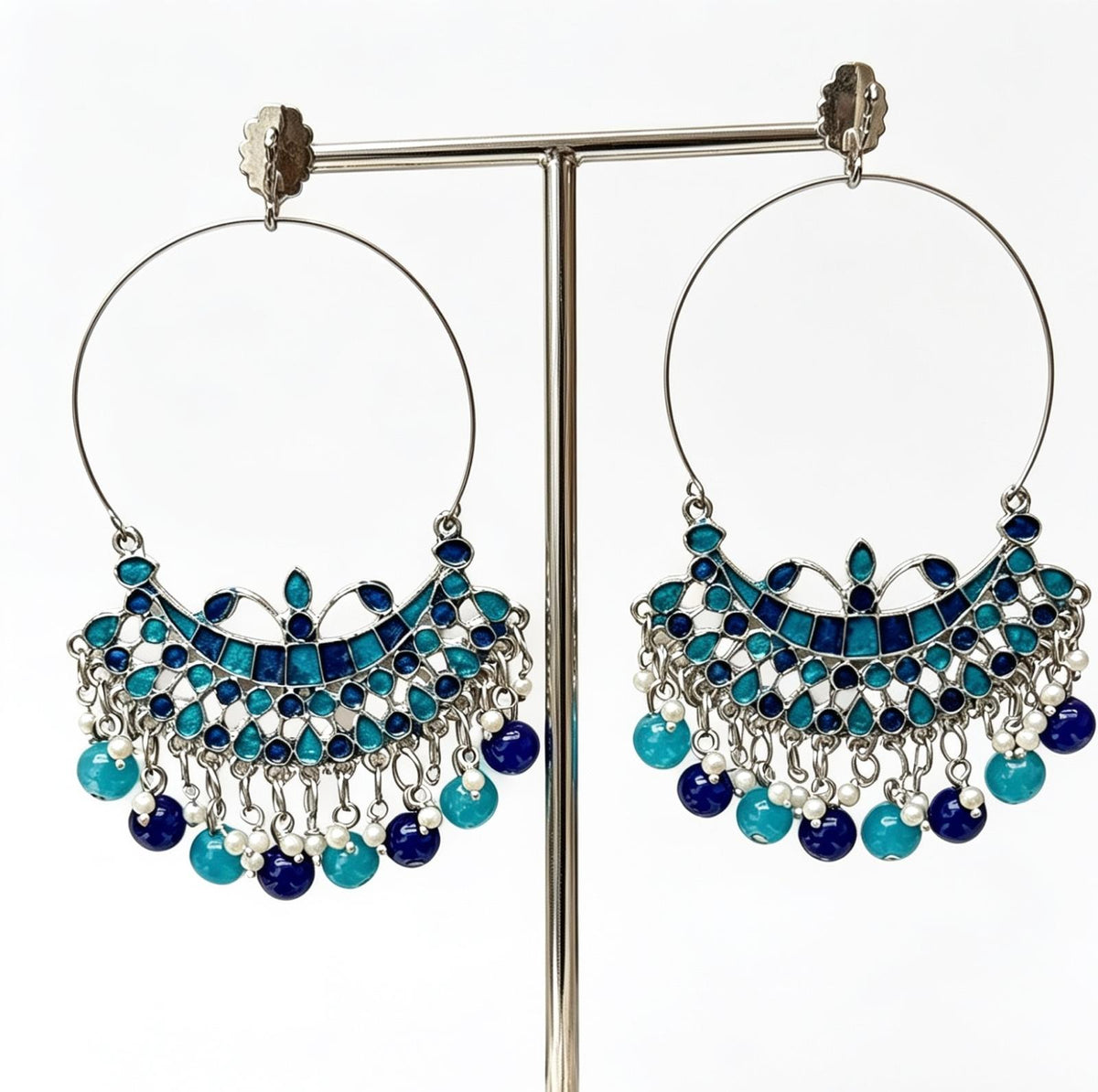 Silver-tone hoop earrings with enamel-painted chandbali centre, cobalt blue and turquoise detailing, white pearl accents, cobalt and turquoise bead drops, traditional Indian Pakistani bridal festive jewellery.