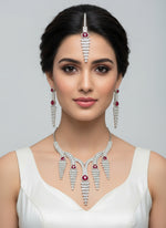 white American diamonds with Red ruby imitation drop necklace,earrings and maang tikka Famaza Couture