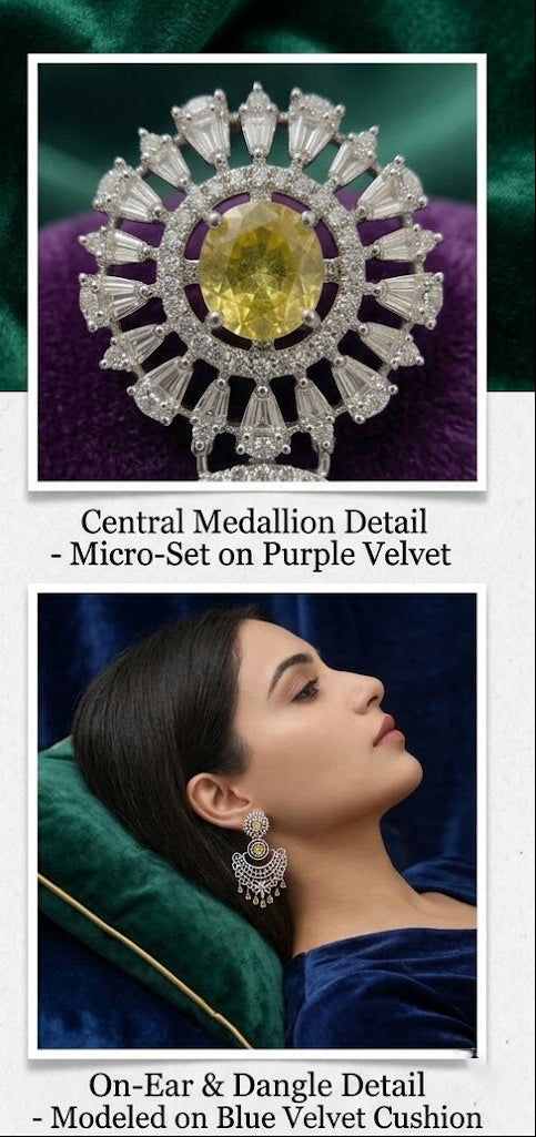 A pair of intricate silver filigree chandbali earrings featuring central round yellow stones and hanging teardrop crystals, draped on a textured dark green velvet fabric.