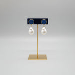 The Handcrafted Mother of Pearl and navy blue Sugar Stone Stud Earrings in Brass – Elegant Bridal and Evening Wear Jewellery for Women.