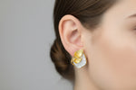 Gold plated mother of pearl petal flower stud earrings by Famaza Couture