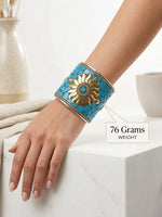 Handcrafted wide statement cuff with a 76g weight, featuring brilliant turquoise mosaic tiles and an antique brass sunflower center charm.