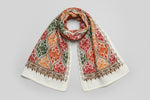 The White base colour Kashmiri embroidered Scarf/shawlwith multi colour machine embroidery by Famaza Couture
