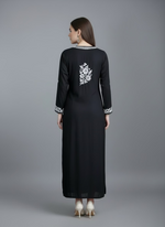The back side design is showing in this image for this black colour modal fabric white chikankari embriodered long kurti