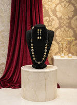 The luxury Tanjore Art Meenakari hot black beaded Mala Set, featuring a regal bridal necklace and matching earrings with black and gold details.