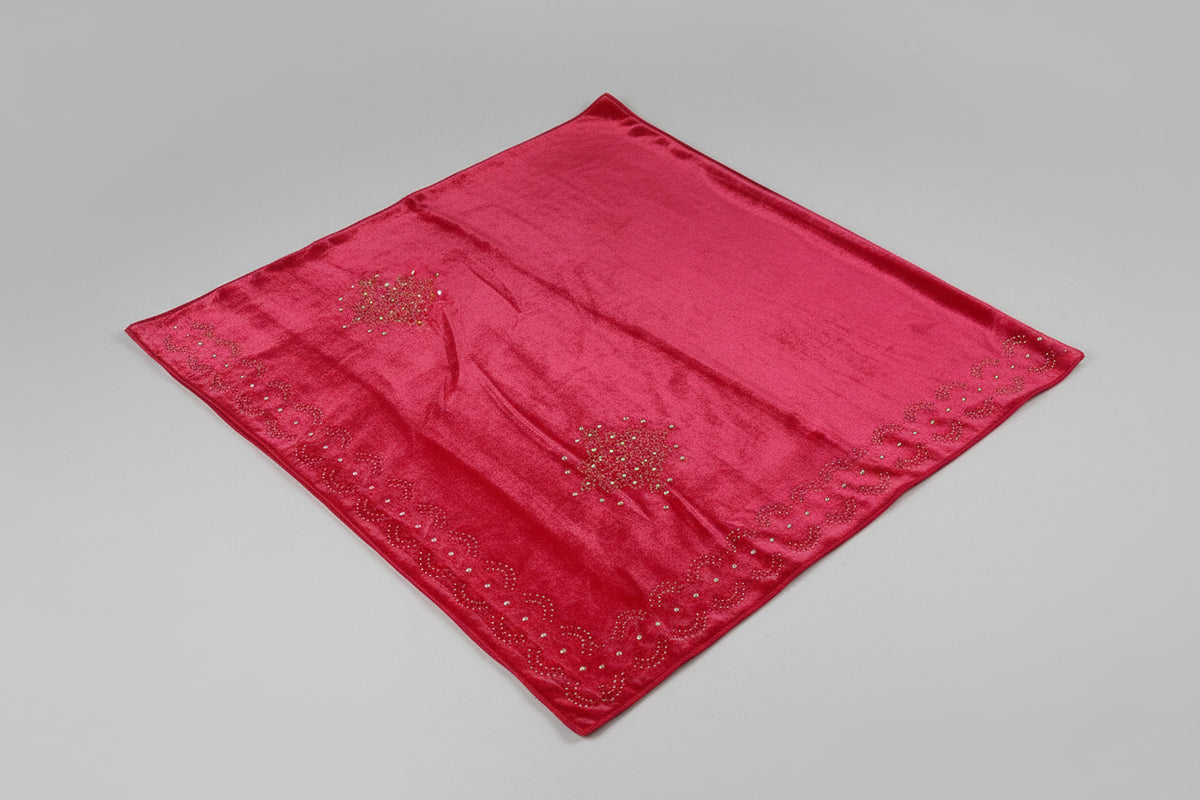 The red colour velvet fabric shawl with gold colour nano beads embellishments and intricate floral patterns.