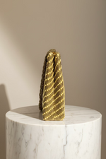 The tote bag with gold diagonal lines of round beads handcrafted on a gold silk base.