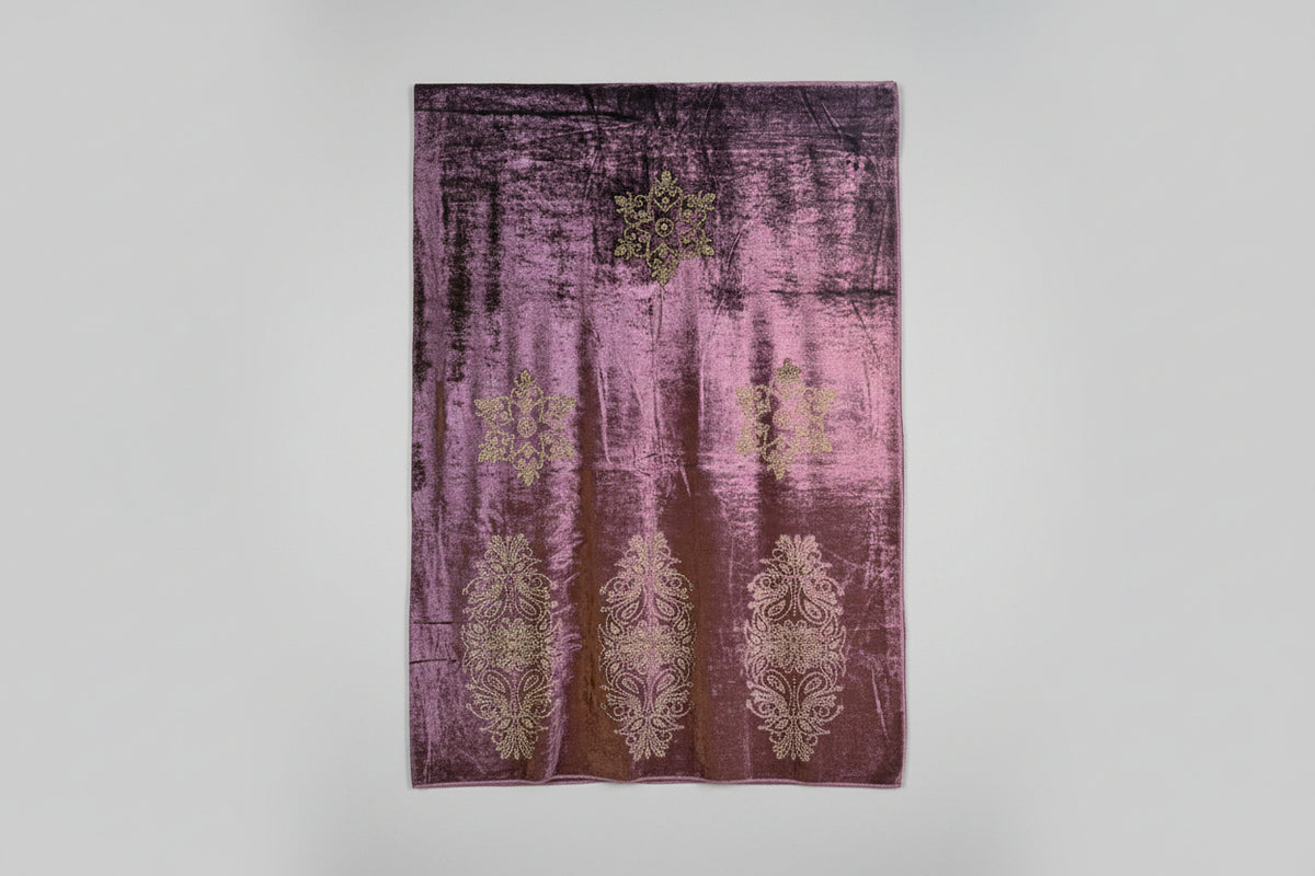 The violet purple velvet stole with Swarovski crystal embellishments and intricate floral patterns by Famaza Couture.