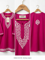 Three views of a bright magenta pink tunic top with white embroidery, hanging on wooden hangers. The center view shows the front with detailed white floral embroidery around the neckline, while the left view shows the side and hem, and the right view shows the back with a small white embroidered motif.