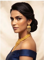 Posh model wearing the Wareesha Heritage Gold-Plated Filigree Statement Jewelry Set by Famaza Couture.