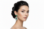 Emarald green central stone earrings.