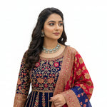 Young woman wearing the Lilia artisanal lotus silver oxidised choker and stud set, styled for an elite evening jewellery look.