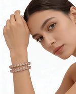 Close-up of Famaza American Diamond Bangles with silver plating and CZ stones.