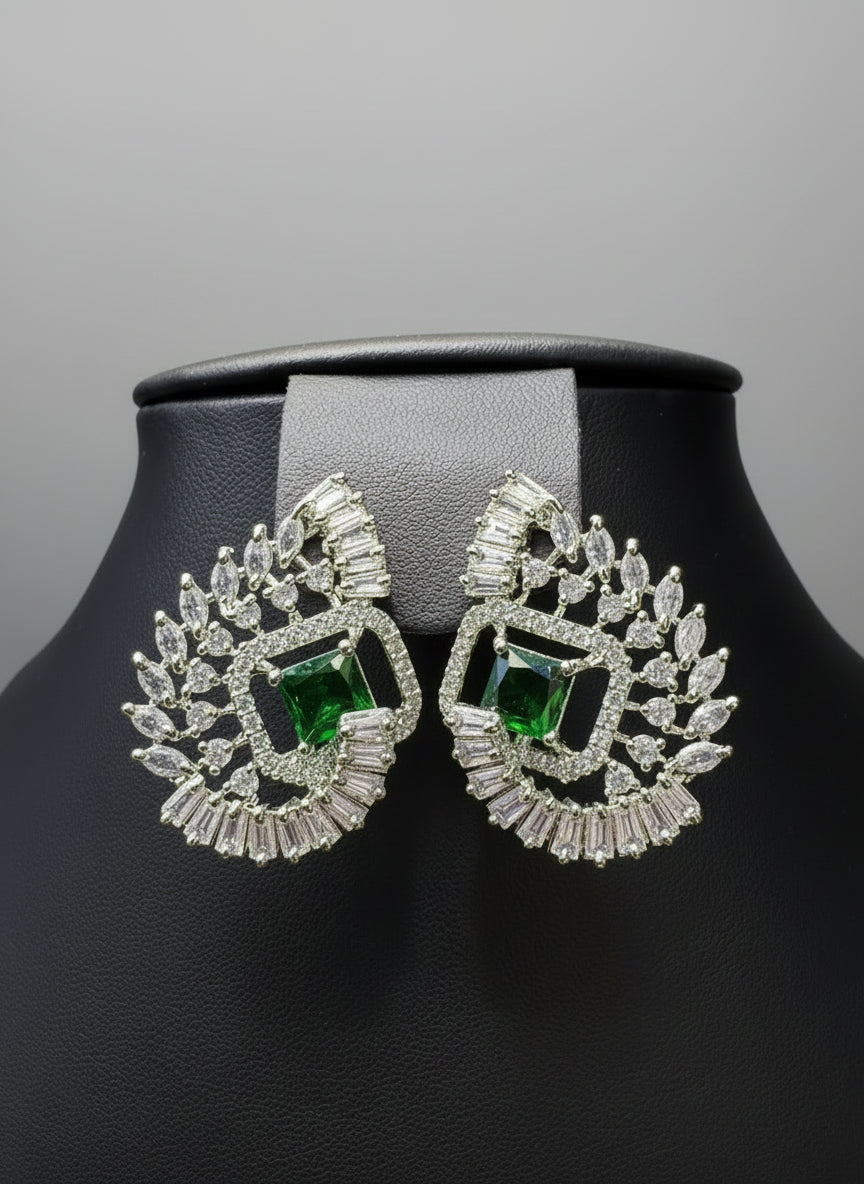 bottle green centre stone earrings, featuring a geometric design with intricate detailing, displayed on a black mannequin. Party wear set.