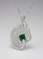 bottle green centre stone pendant, featuring a geometric design with intricate detailing, displayed on a black mannequin. Party wear set.