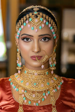 “9-piece gold bridal jewellery set for Pakistani weddings