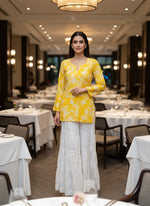 white flared trousers