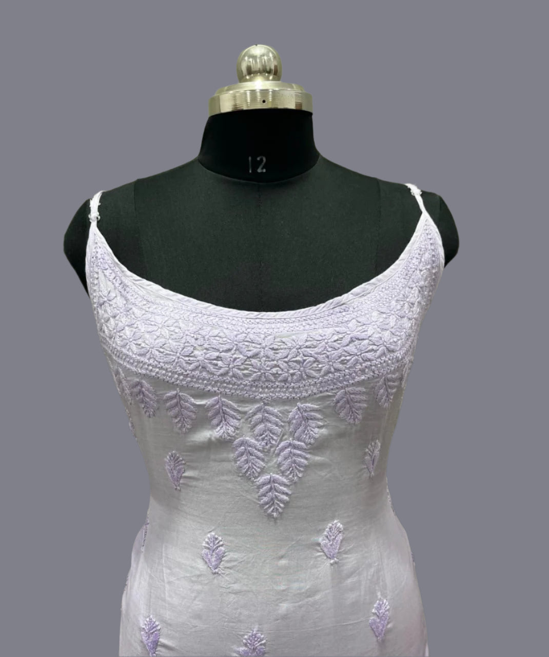 Close up of Chikanlkari cotton slip dress showing detailed embroidery