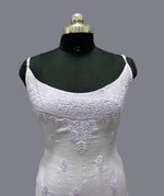 Close up of Chikanlkari cotton slip dress showing detailed embroidery