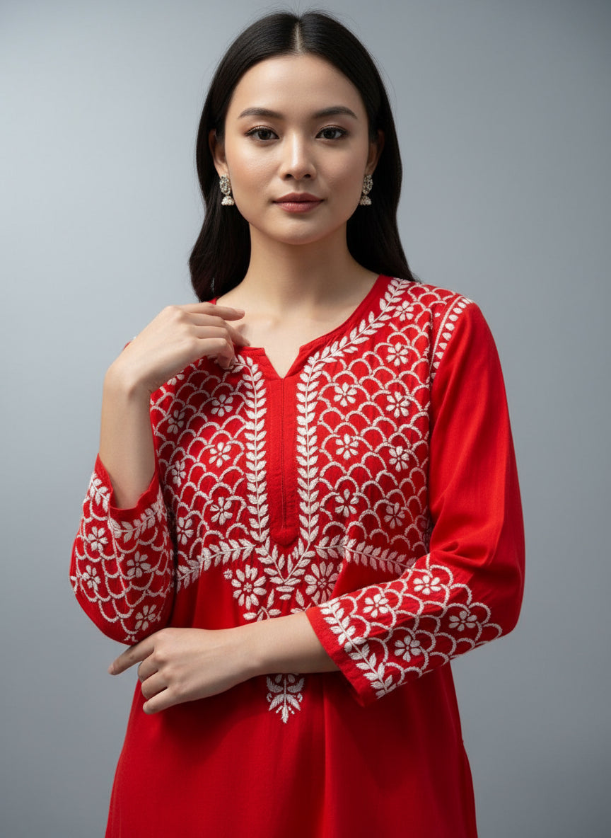 upper body close up of Chikankari kurti in palazzo set in red with white embroidery