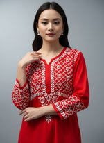 upper body close up of Chikankari kurti in palazzo set in red with white embroidery