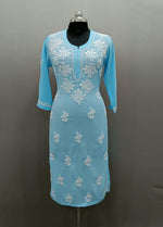 Chikankari kurti with Ghass Patti embroidery on a mannequin in sky blue colour