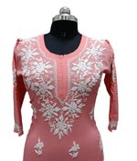 close up of Chikankari kurti with Ghass Patti embroidery on a mannequin in watermelon pink colour