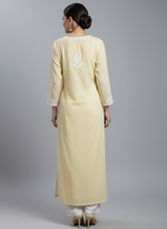 yellow colour Chikankari kurti top with large floral embroidery, rear view