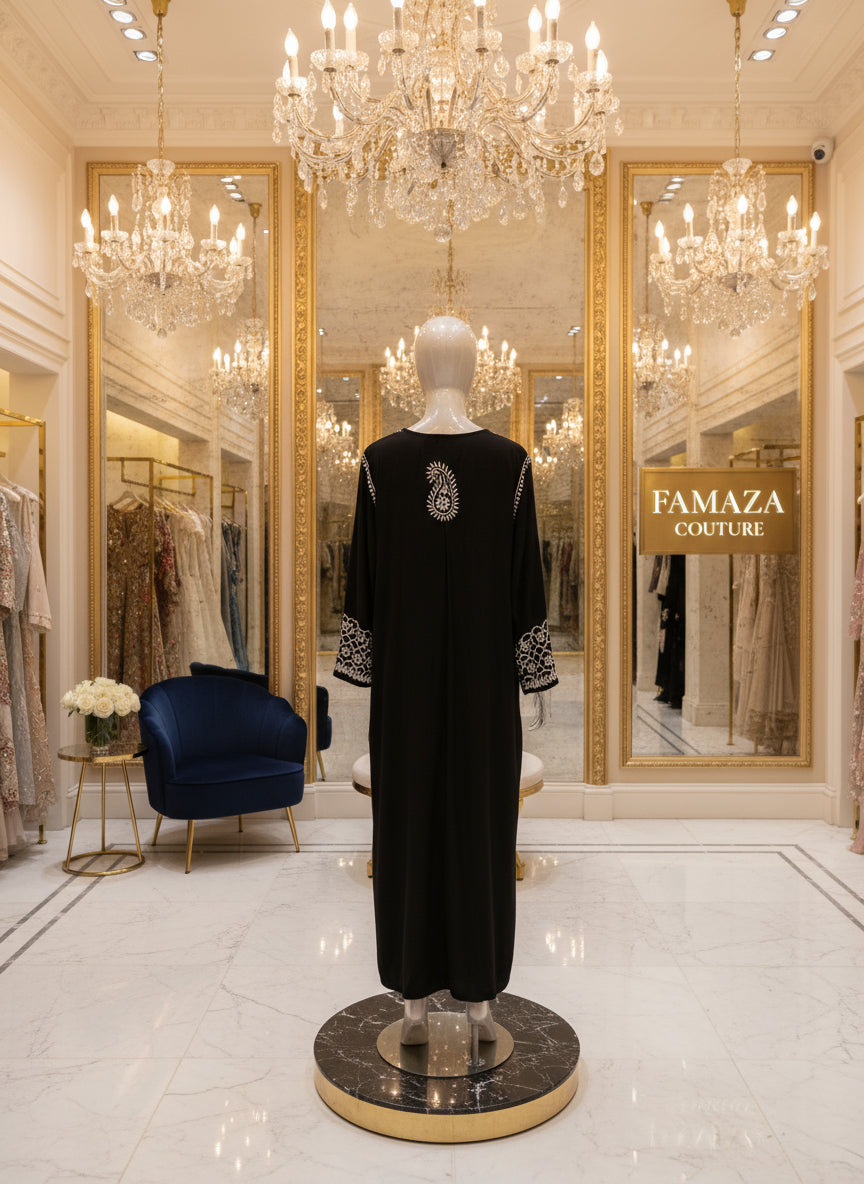 rear view of Chikankari kurti in palazzo set in black with white embroidery