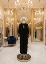 rear view of Chikankari kurti in palazzo set in black with white embroidery