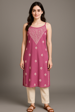 Model wearing Chikankari slip dress kurti in lilac colour with cream chinos and sandals