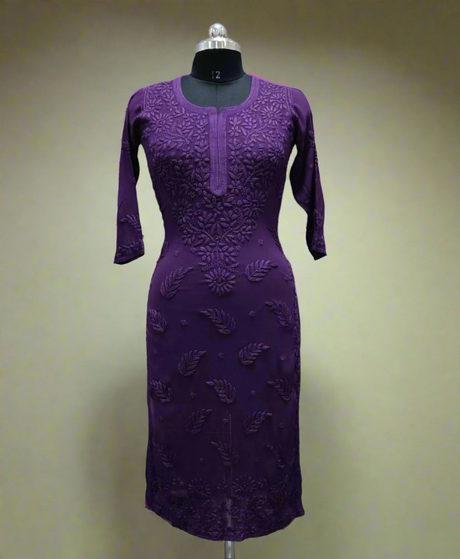 A long, purple viscose kurti with hand-embroidered Chikankari patterns displayed on a mannequin.