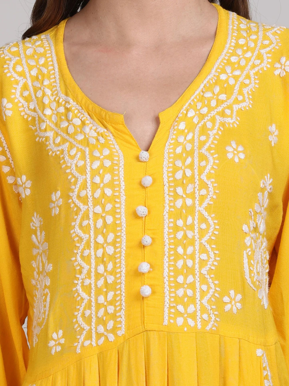 Indian tunic top with chikankari detail, close-up of embroidery